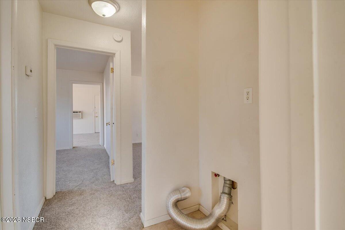533 North G Street Lompoc, CA 93436 - Photo 21 of 32 a view of a bathroom from a hallway