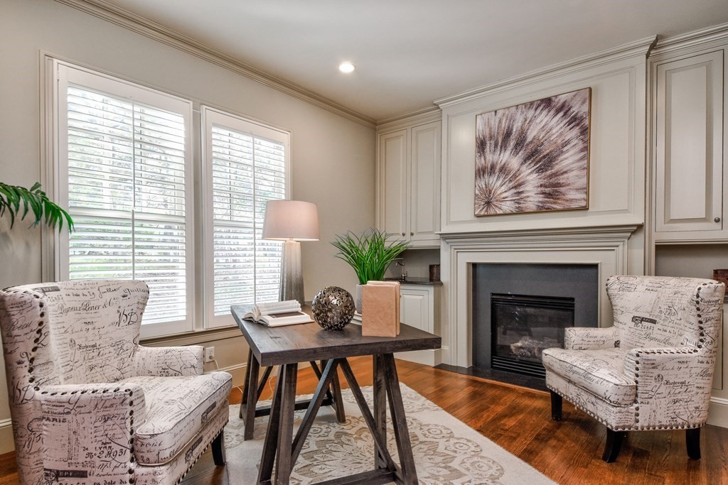 150 Glen Road Wellesley, MA 02481 - Photo 20 of 42 a living room with furniture and a fireplace