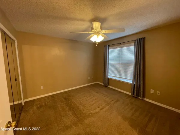 a bathroom with a sink vanity and a mirror