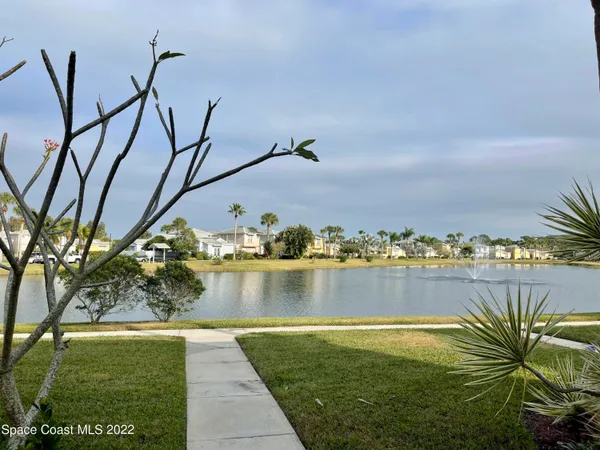 a view of a lake with a city