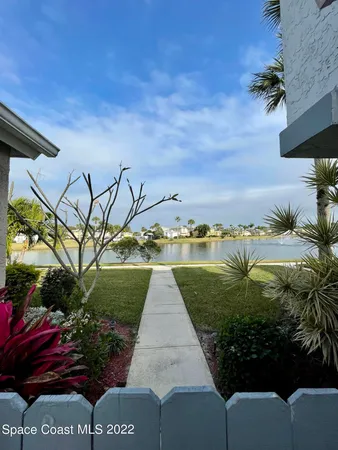 a view of a lake with a garden