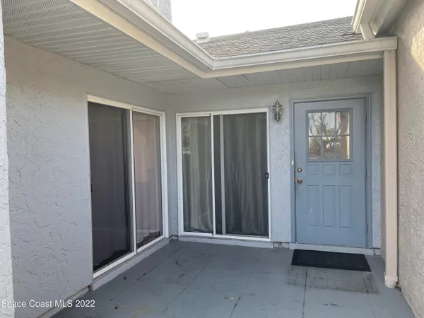 a view of a lake with a fountain and a fountain
