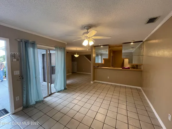 a kitchen that has a sink and a stove in it