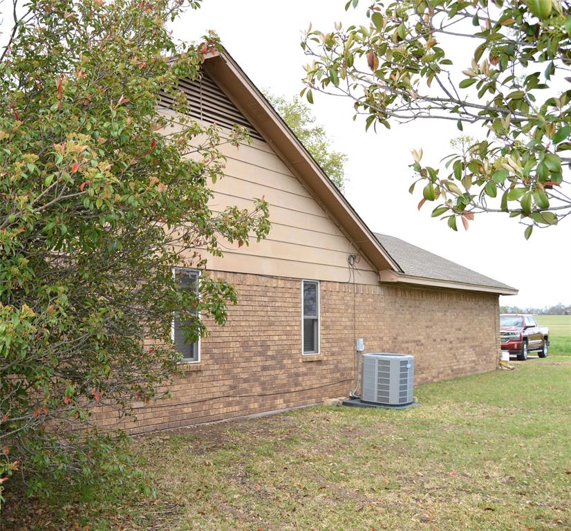 1012 Meridith Drive Terrell, TX 75160 - Photo 3 of 26 View of home's exterior featuring brick siding and a yard
