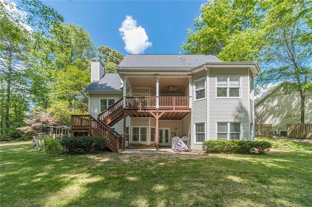 395 Amberbrook Circle Grayson, GA 30017 - Photo 53 of 70 a view of a house with a backyard