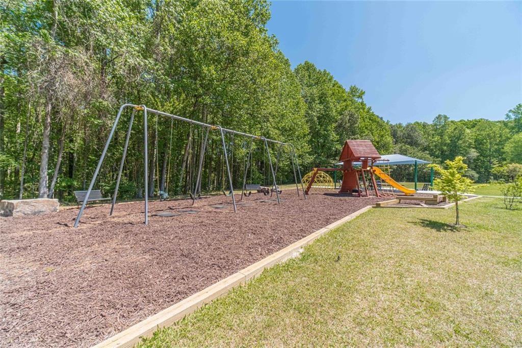 395 Amberbrook Circle Grayson, GA 30017 - Photo 67 of 70 a view of a park with swings