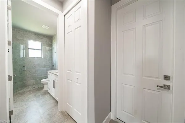 a bathroom with a sink and mirror