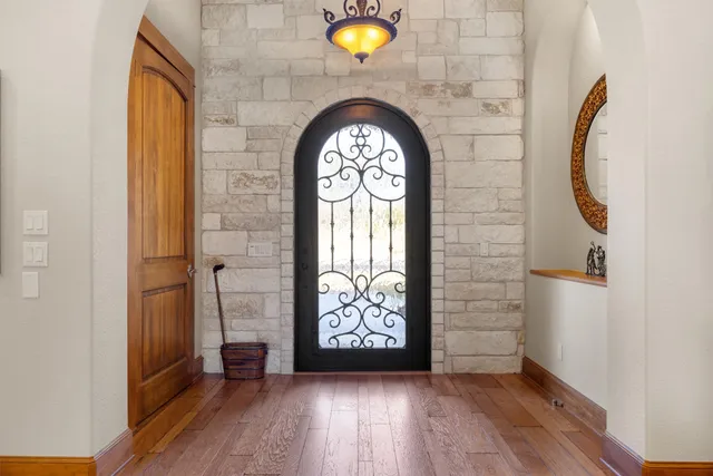 a view of entryway with wooden floor