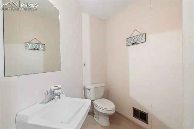 a spacious bedroom with a large bed and a large window