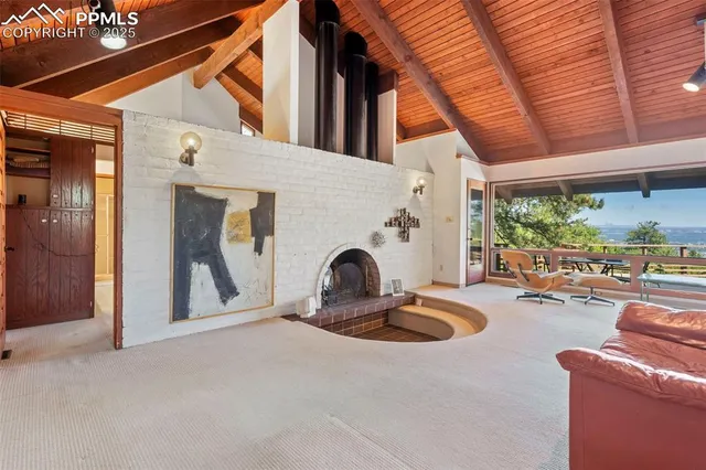 a view of a house with tub and chairs