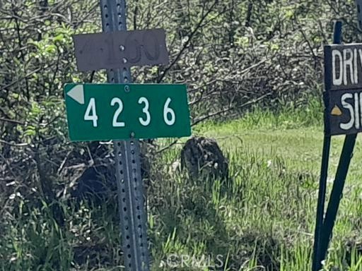 4236 Kakini Road Oroville, CA 95965 - Photo 7 of 7 a sign that is on a pole