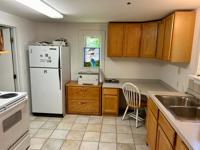 a picture of a park with furniture and a window