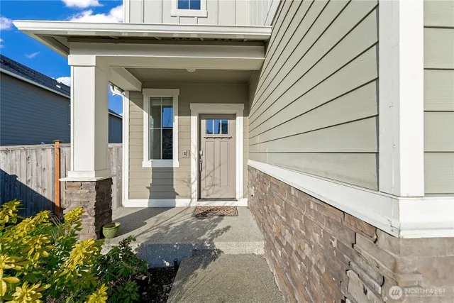 a front view of a house with a garage