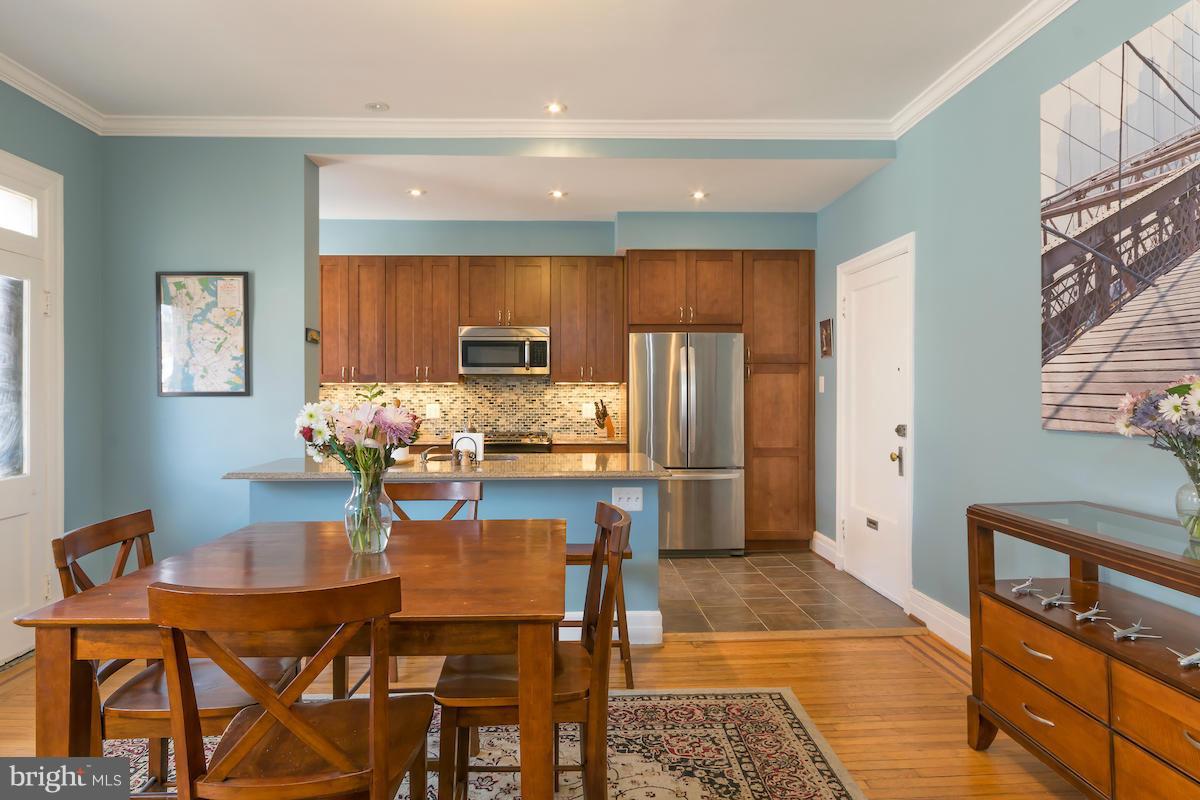 1734 P Street Northwest, Unit 46 Washington, DC 20036 - Photo 6 of 16 a view of a dining room with furniture