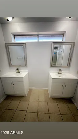 a bathroom with a bathtub and sink
