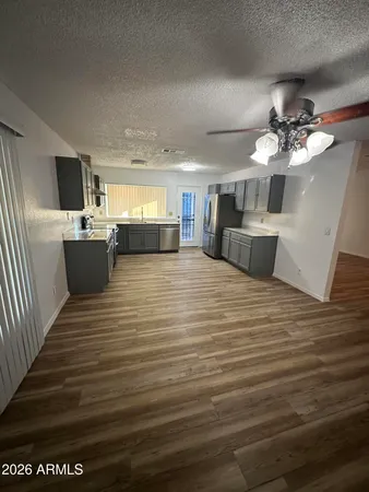 a view of a living room a kitchen