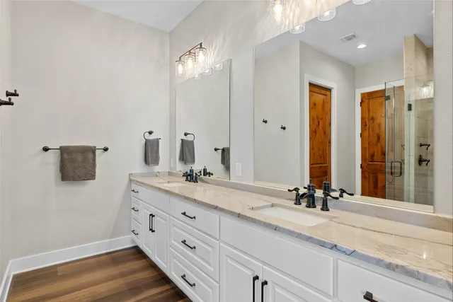 a view of a balcony with wooden floor