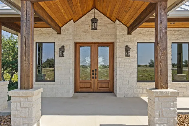 a front view of a house with porch