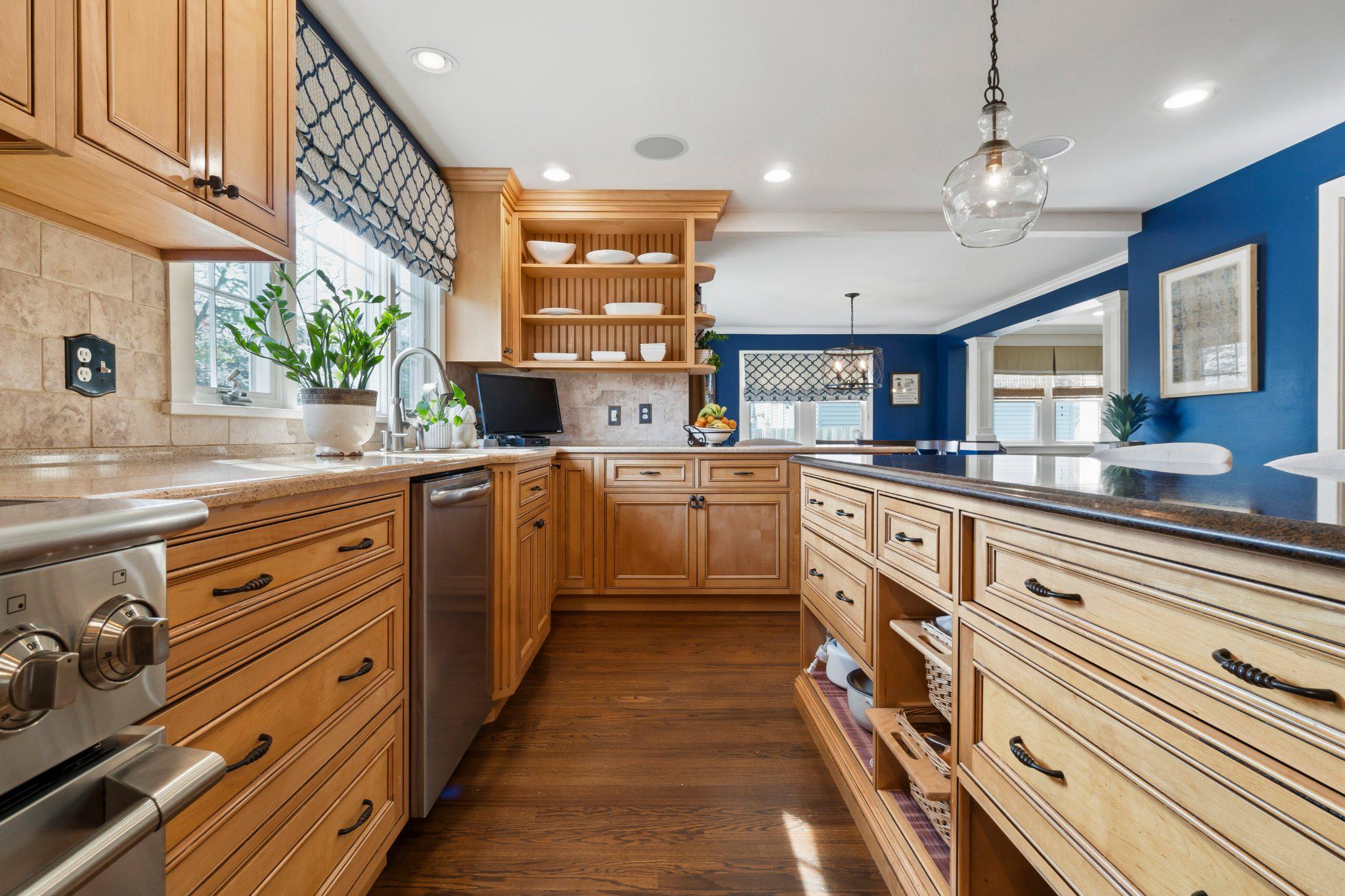 272 Jefferson Avenue Haddonfield, NJ 08033 - Photo 16 of 43 a kitchen with stainless steel appliances kitchen island granite countertop a sink and cabinets