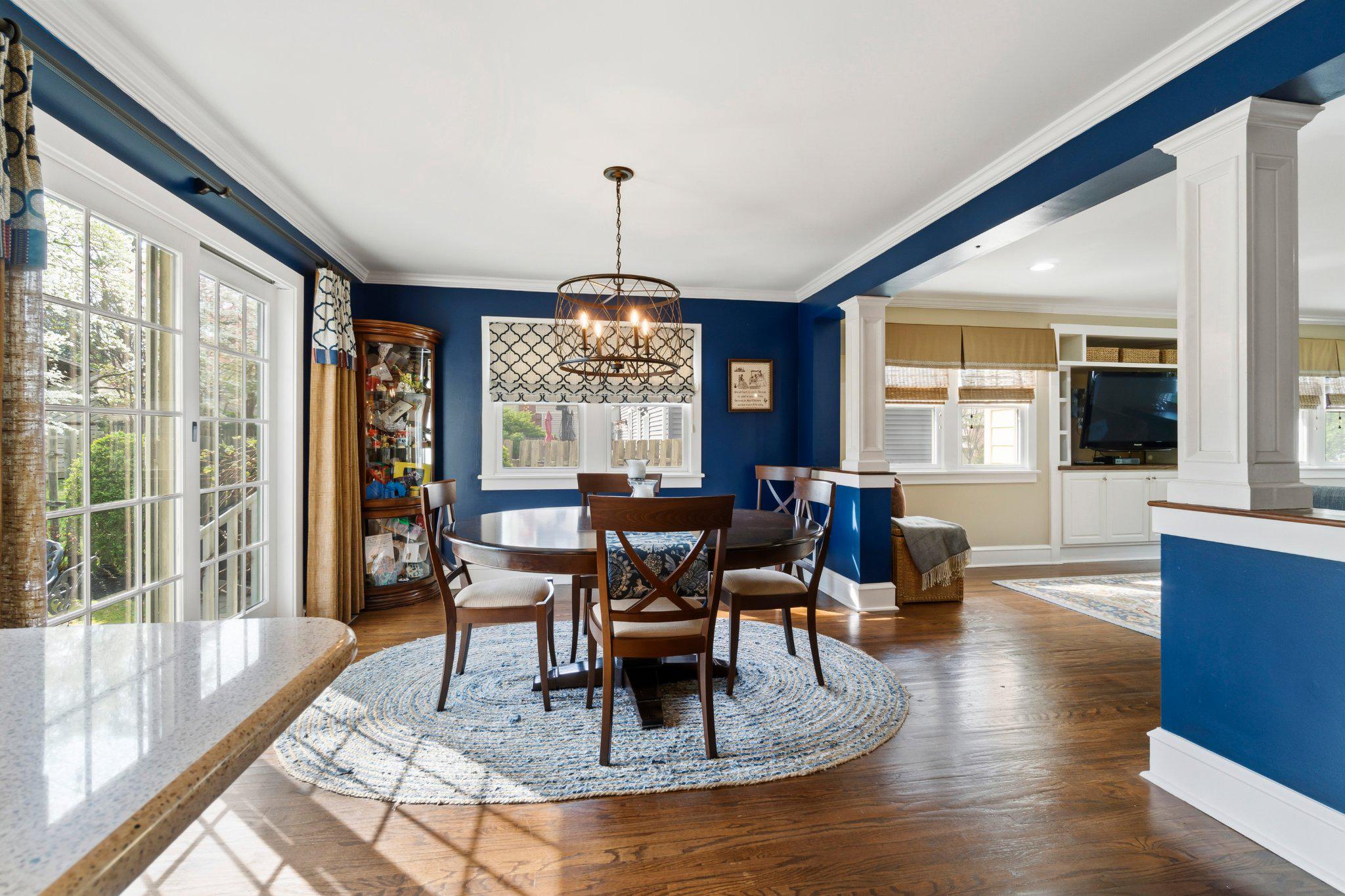 272 Jefferson Avenue Haddonfield, NJ 08033 - Photo 17 of 43 a dining room with furniture a chandelier and wooden floor
