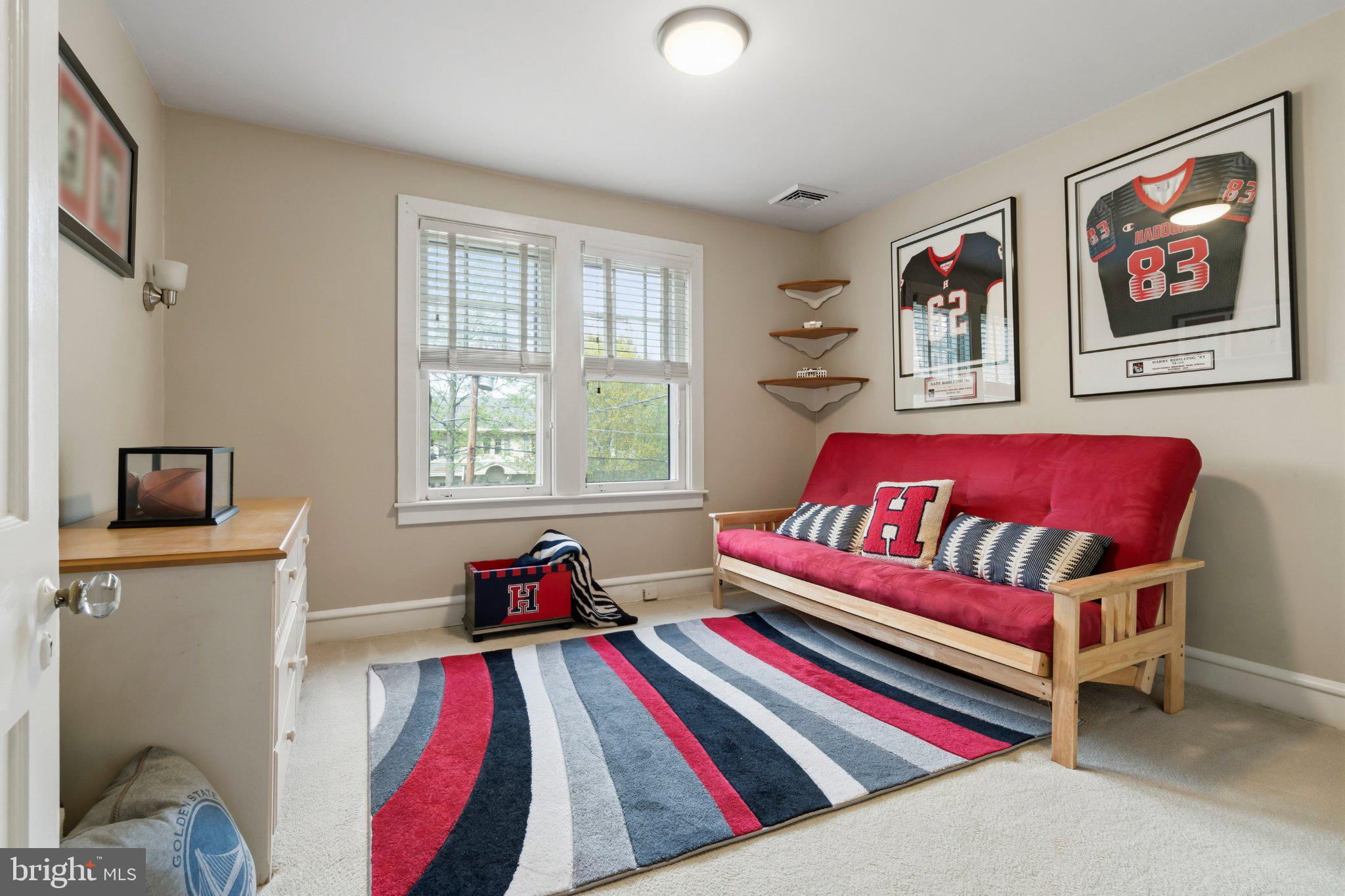 272 Jefferson Avenue Haddonfield, NJ 08033 - Photo 26 of 43 a bed room with a bed and a book shelf