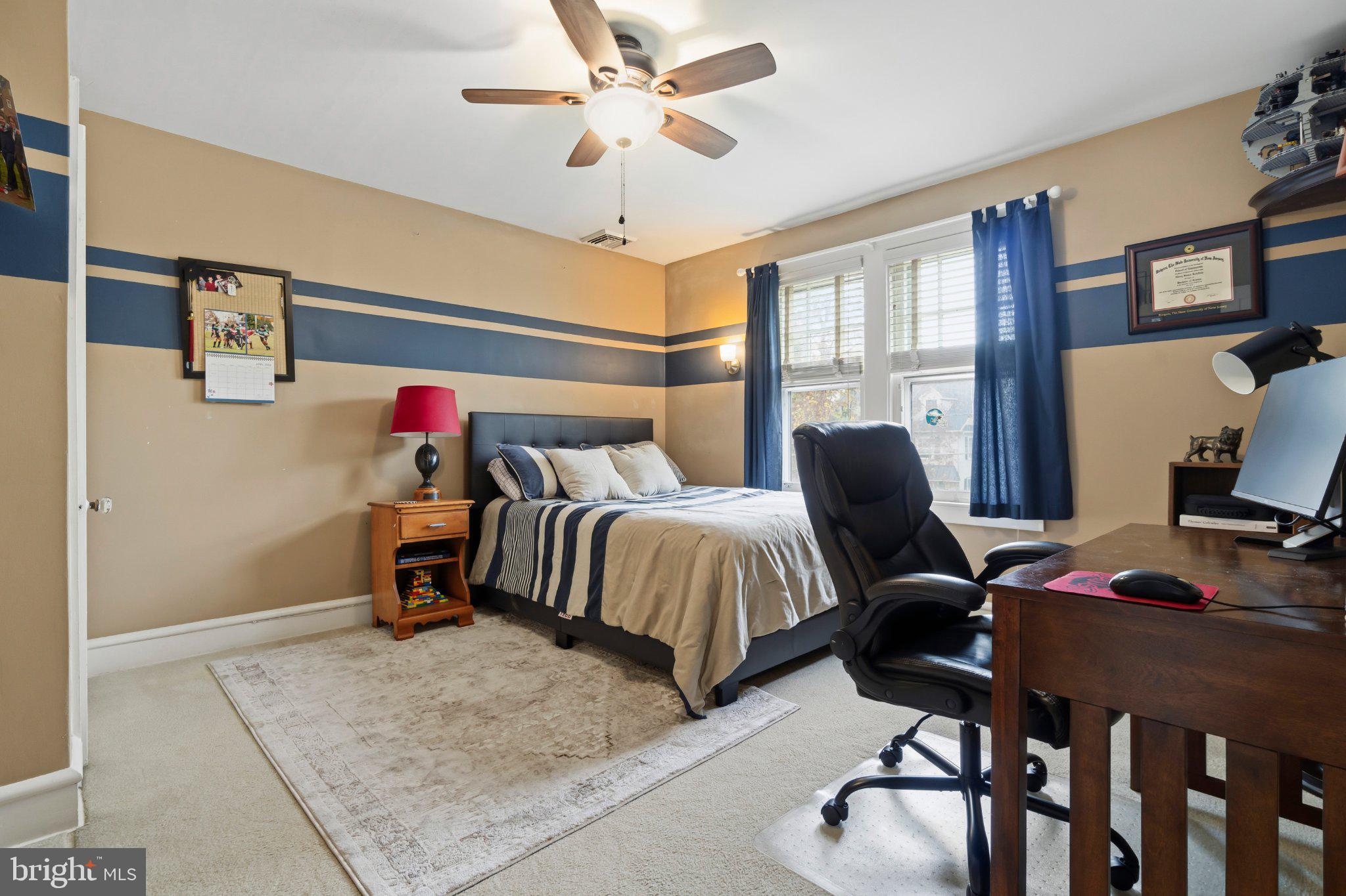 272 Jefferson Avenue Haddonfield, NJ 08033 - Photo 27 of 43 a bedroom with a bed a desk and chair with the bookshelf