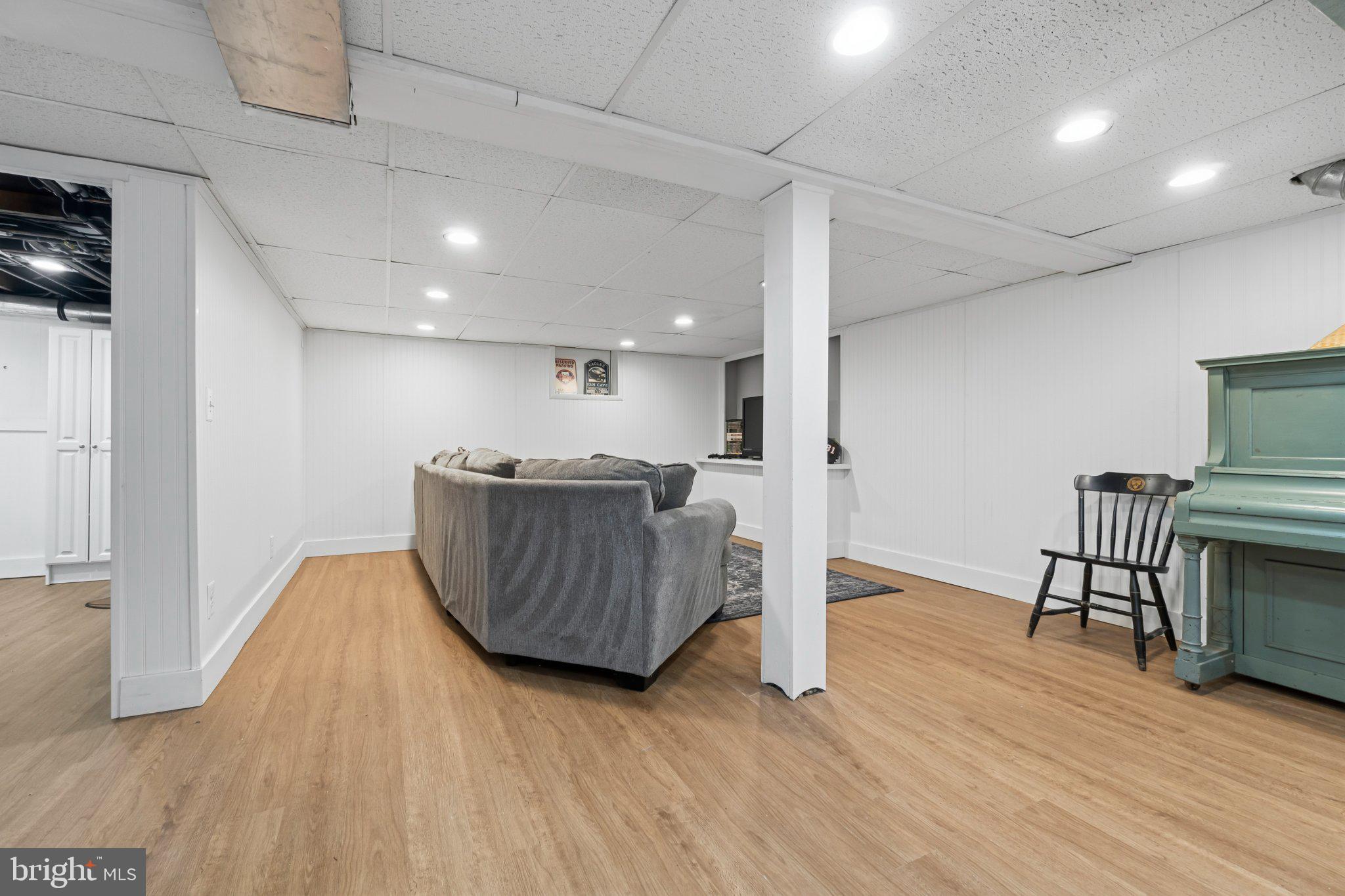 272 Jefferson Avenue Haddonfield, NJ 08033 - Photo 31 of 43 a living room with furniture and a wooden floor