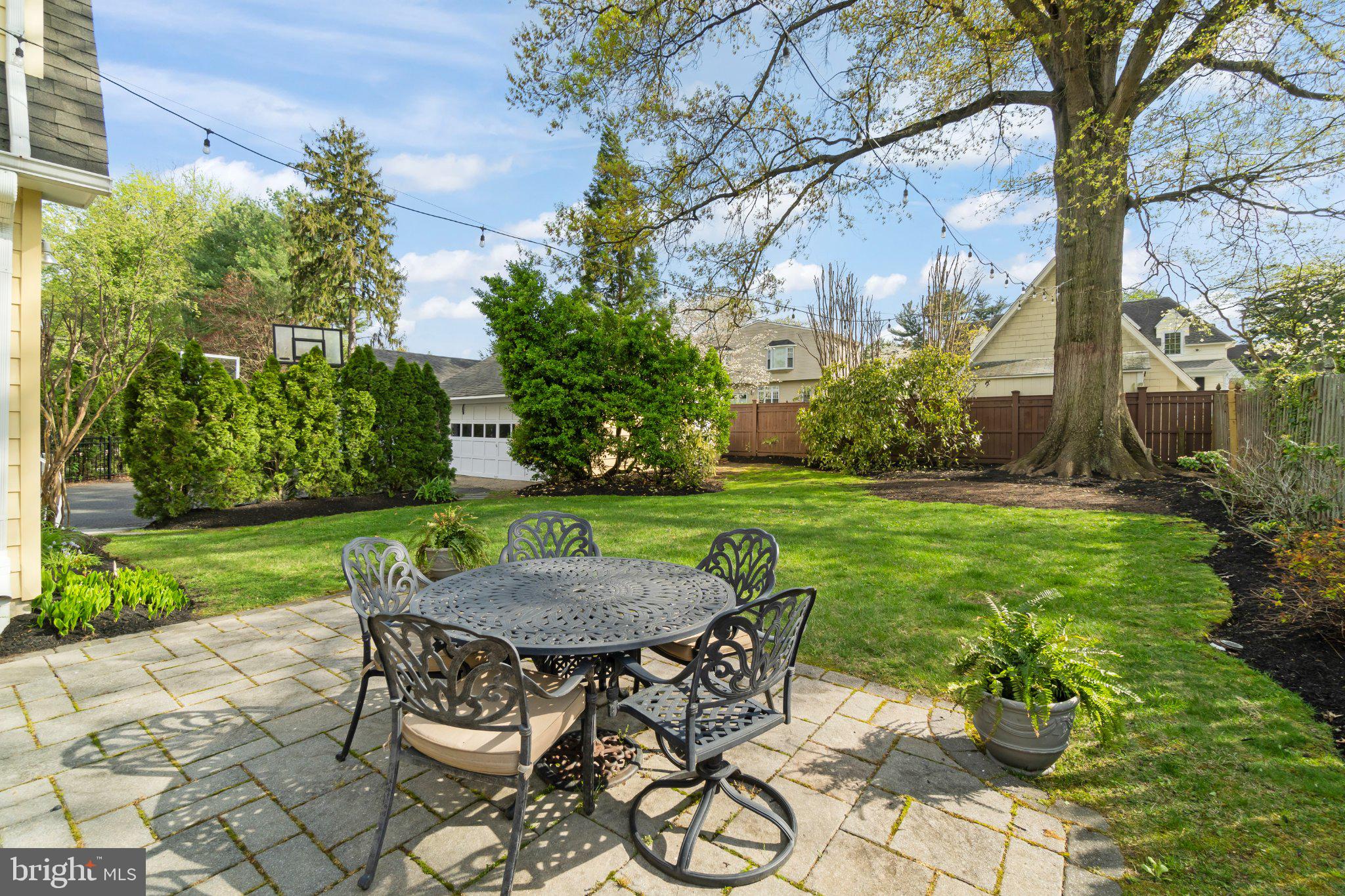 272 Jefferson Avenue Haddonfield, NJ 08033 - Photo 34 of 43 a view of a table and chairs in backyard of the house
