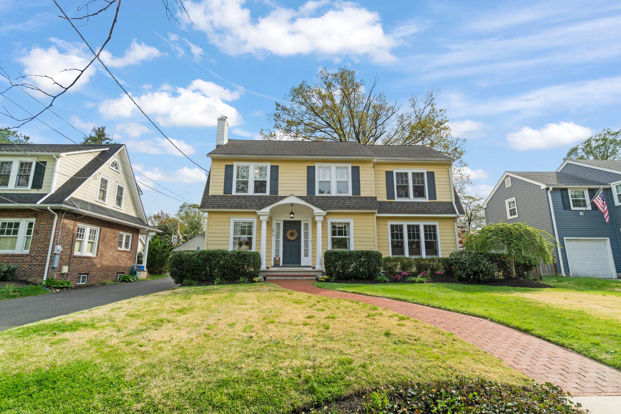 272 Jefferson Avenue Haddonfield, NJ 08033 - Photo 4 of 43 a front view of a house with garden and trees