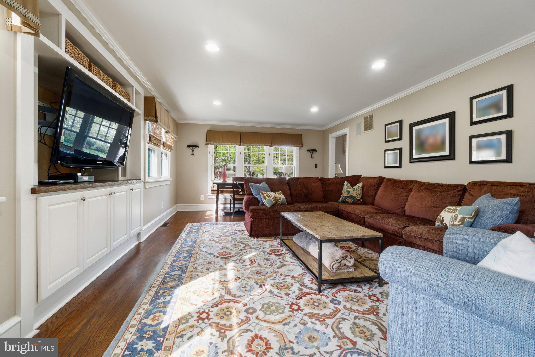 272 Jefferson Avenue Haddonfield, NJ 08033 - Photo 43 of 43 a living room with furniture and a flat screen tv