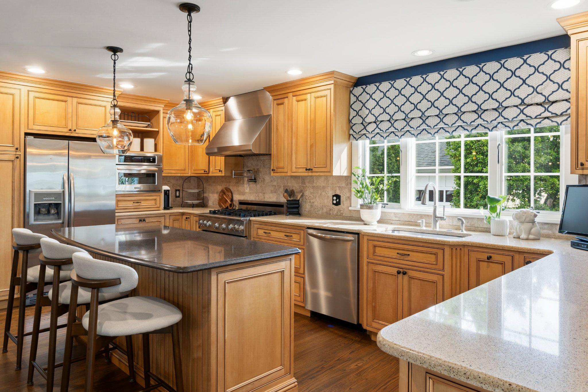 272 Jefferson Avenue Haddonfield, NJ 08033 - Photo 10 of 43 a kitchen with stainless steel appliances granite countertop a sink a stove and a refrigerator