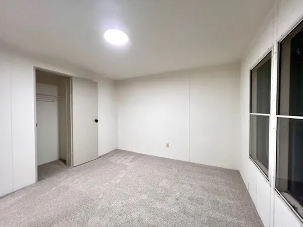 an empty room with closet