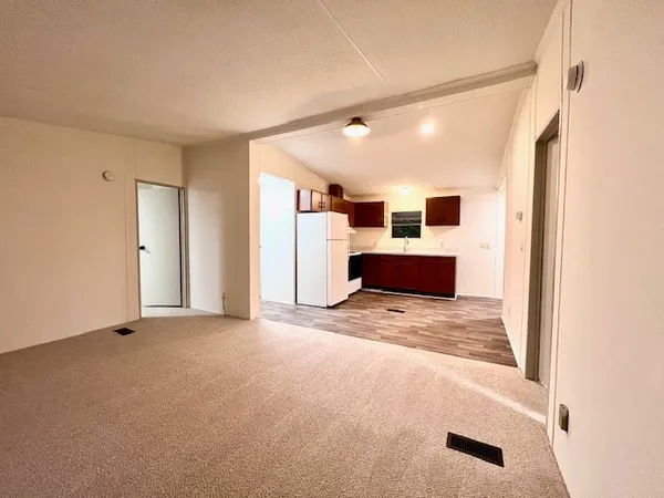 a view of livingroom with furniture and window