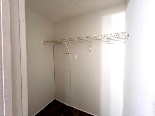 a view of a room with racks on the wall