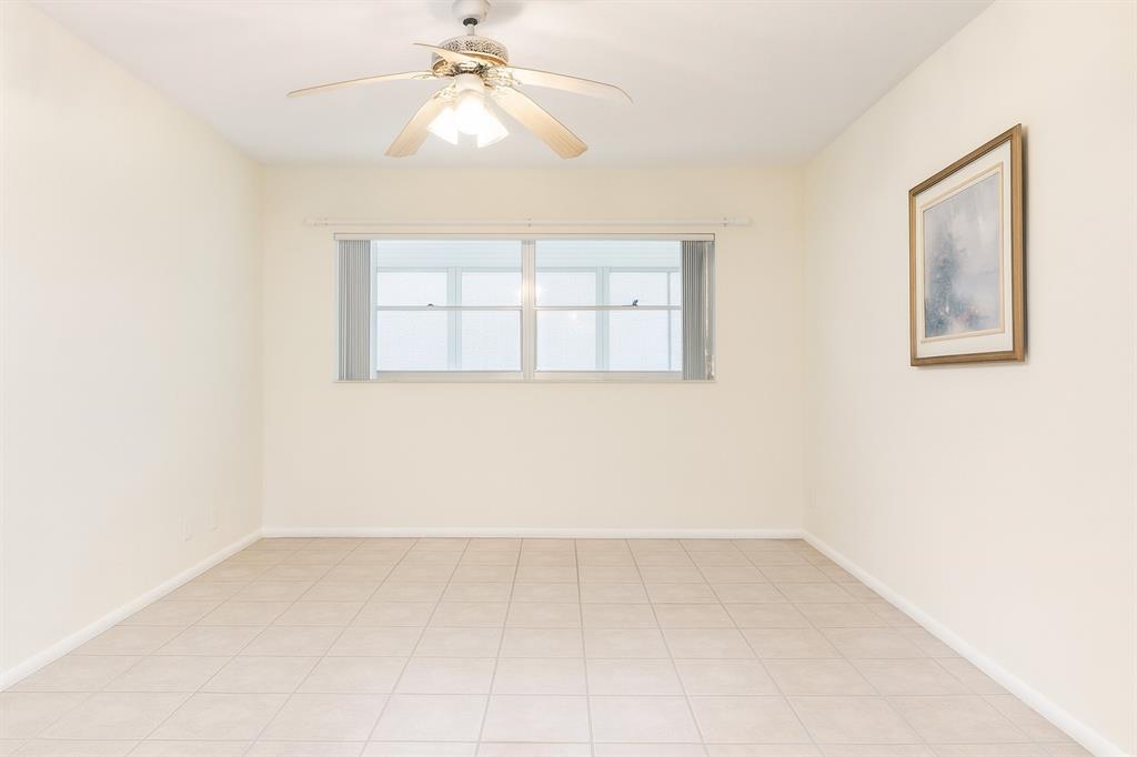 950 Hillcrest Drive, Unit 202 Hollywood, FL 33021 - Photo 7 of 19 an empty room with a window