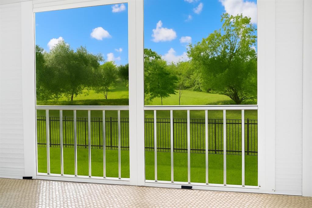 950 Hillcrest Drive, Unit 202 Hollywood, FL 33021 - Photo 9 of 19 a view of a windows and a tree