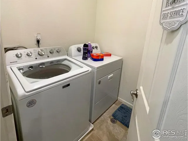 a picture of a bathroom with a shower