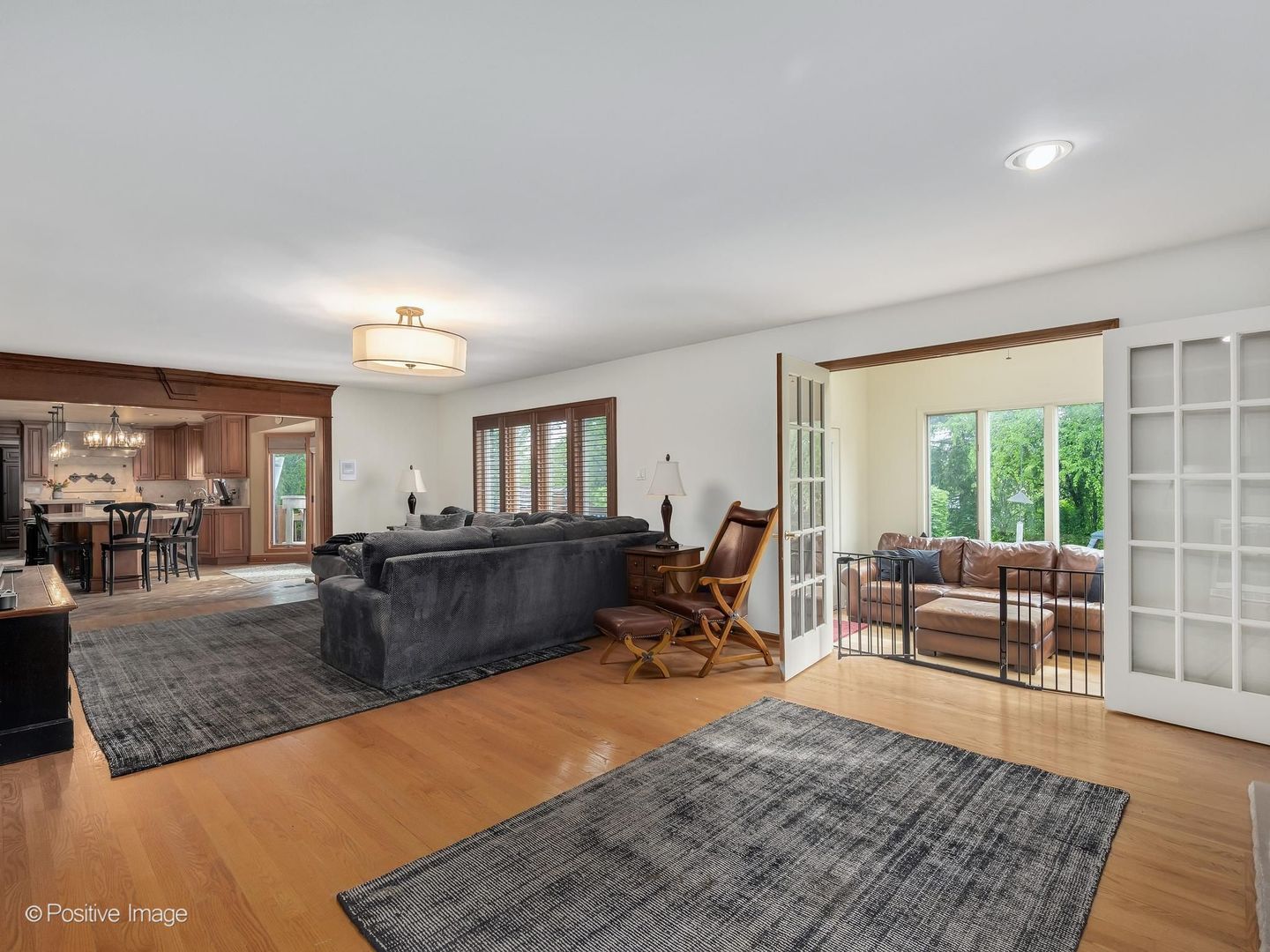 6451 Garfield Ridge Court Burr Ridge, IL 60527 - Photo 13 of 28 a living room with furniture and a wooden floor