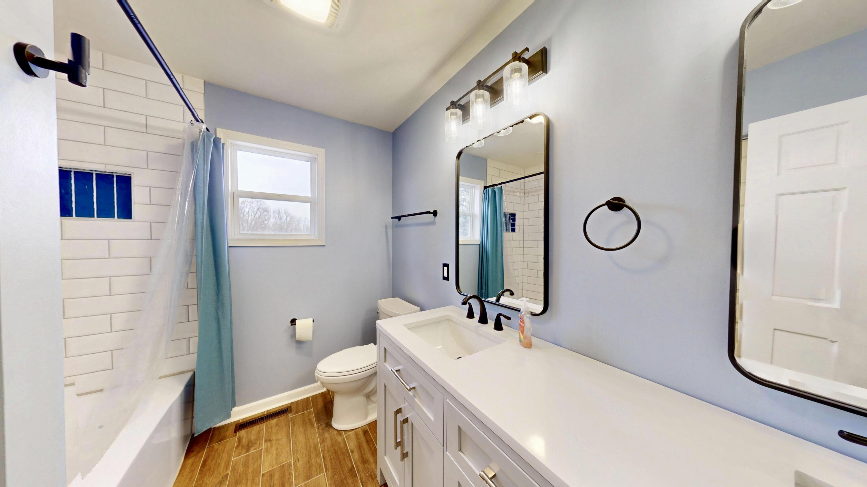 3721 Wirth Road Highland, IN 46322 - Photo 13 of 40 a bathroom with a sink and a mirror