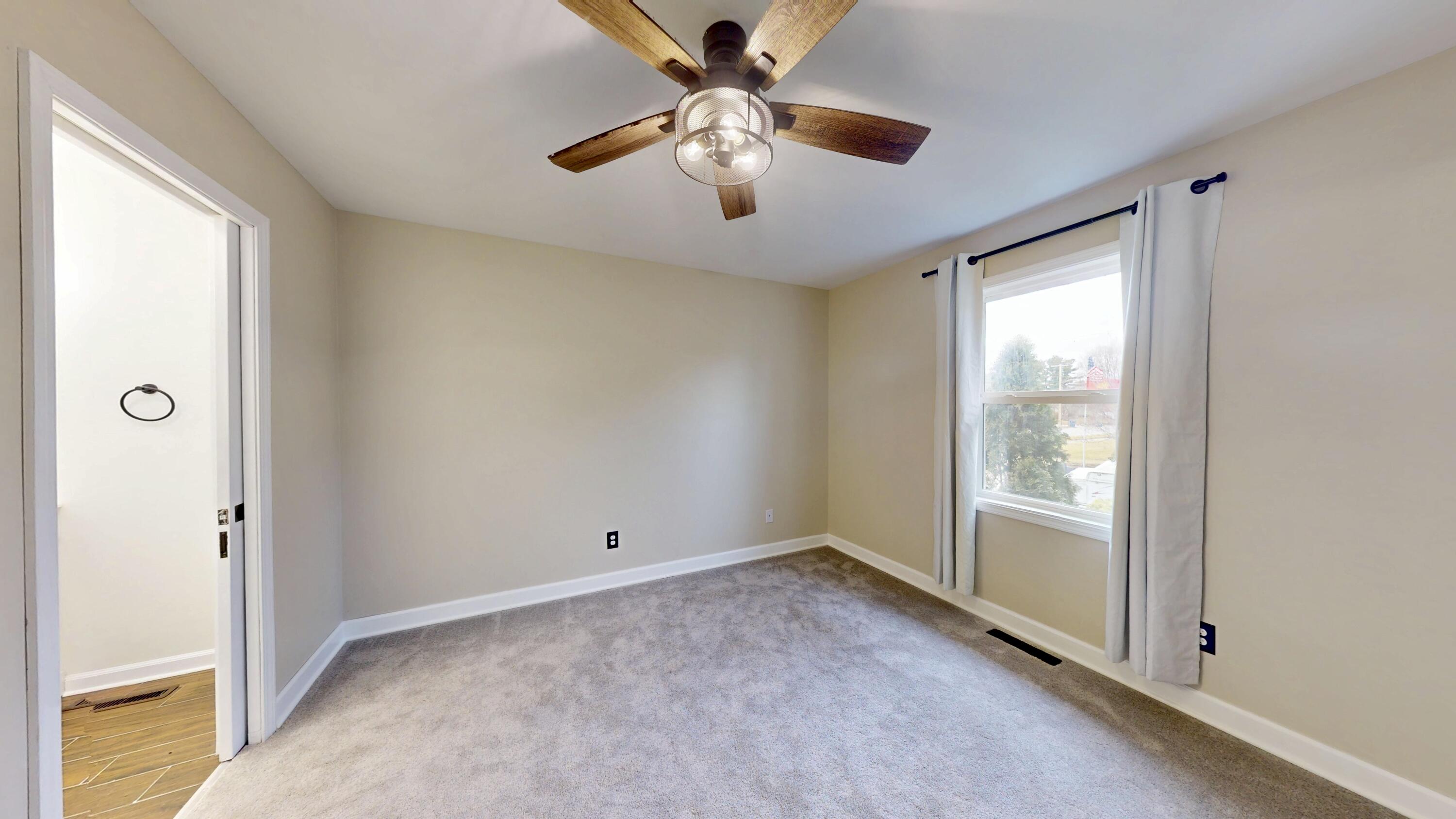 3721 Wirth Road Highland, IN 46322 - Photo 15 of 40 a view of room with window and ceiling fan