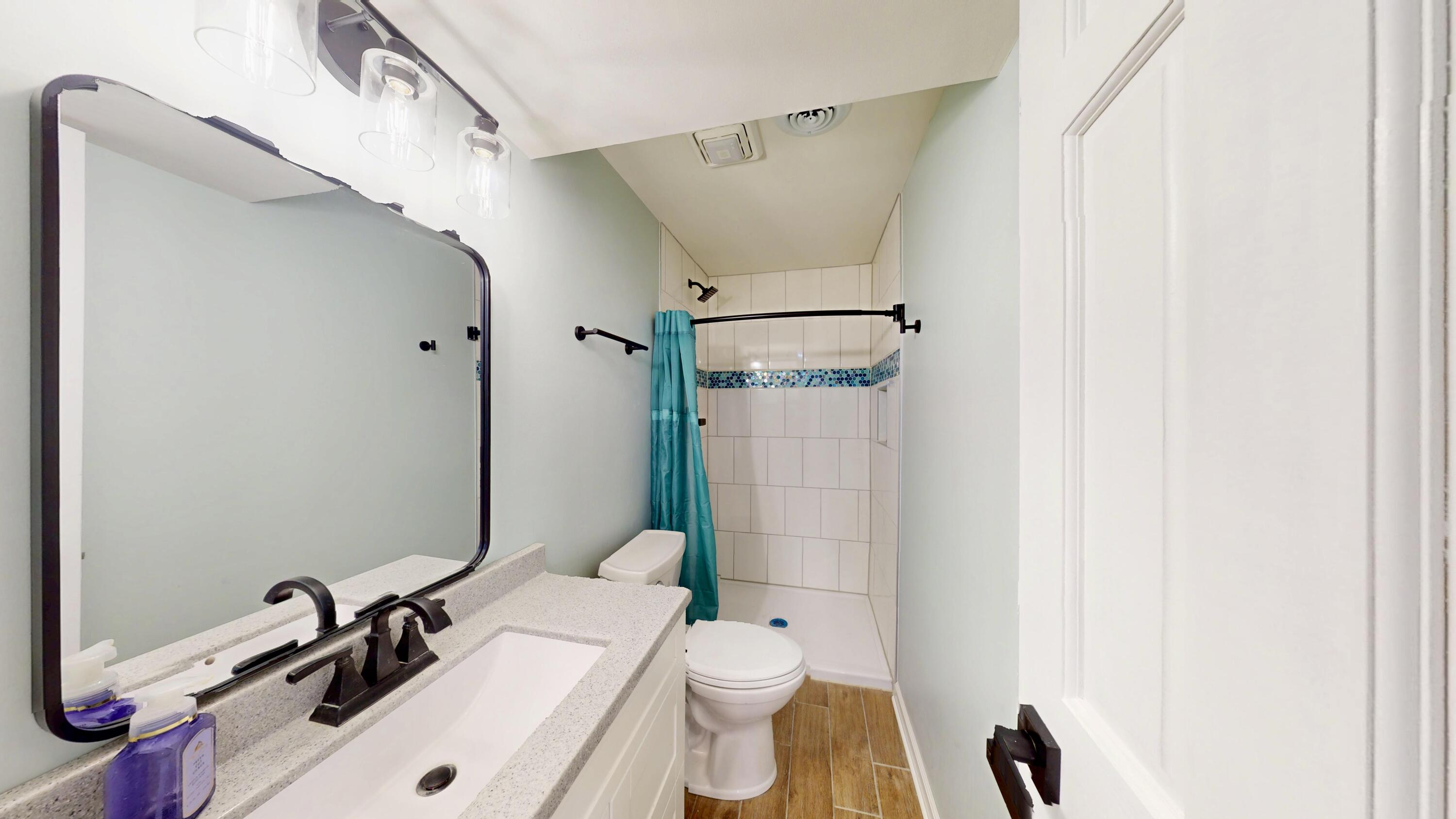 3721 Wirth Road Highland, IN 46322 - Photo 27 of 40 a bathroom with a sink a toilet and shower
