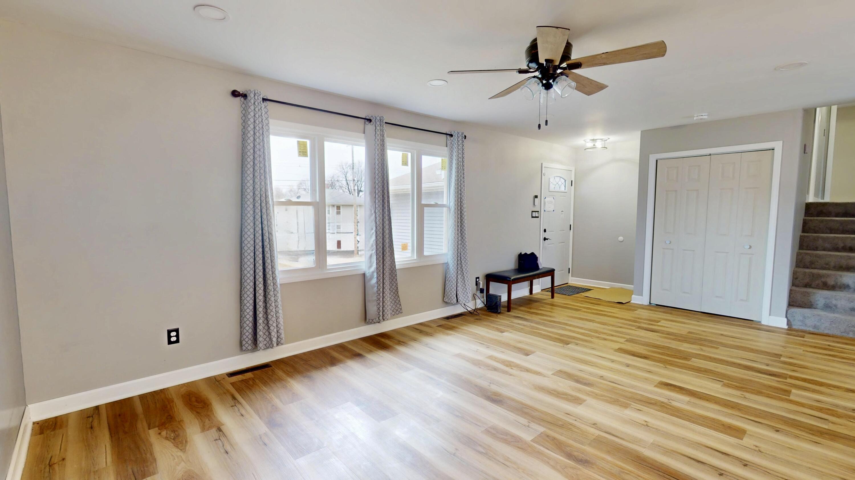 3721 Wirth Road Highland, IN 46322 - Photo 7 of 40 a view of a room with a window and wooden floor