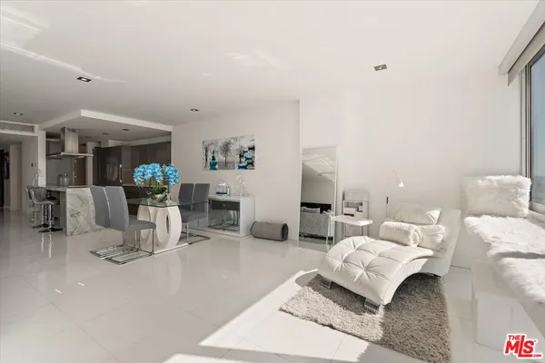 a view of a living room and dining room