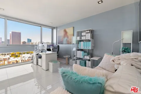 a spacious bathroom with a double vanity sink and a mirror