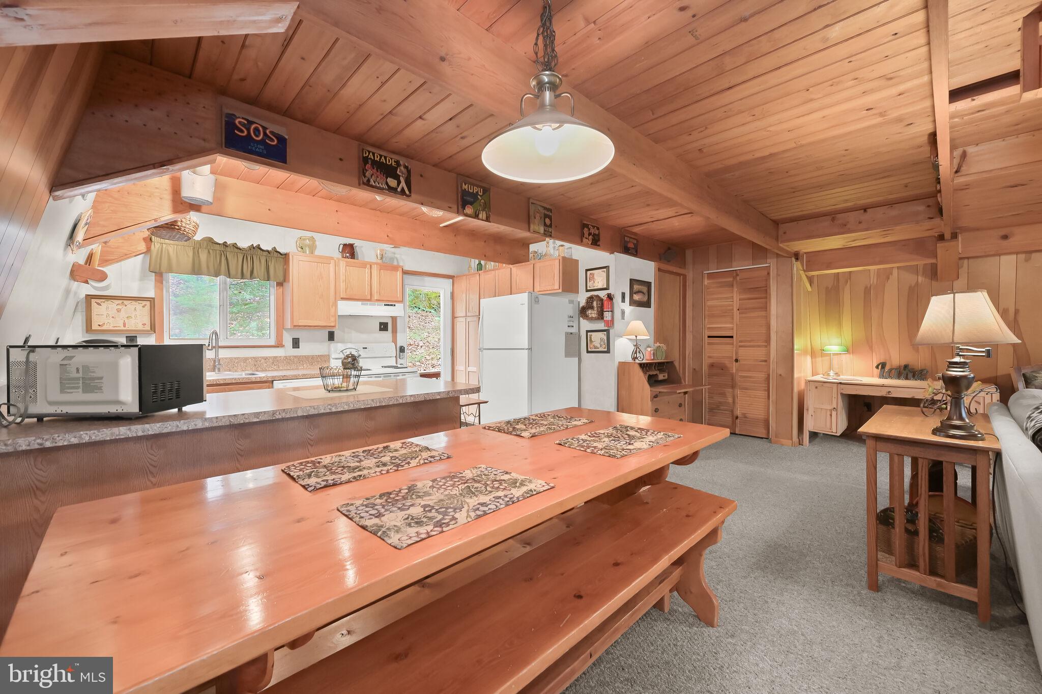 2702 Mayhew Inn Road Oakland, MD 21550 - Photo 19 of 87 Dining Room | Exposed Beams