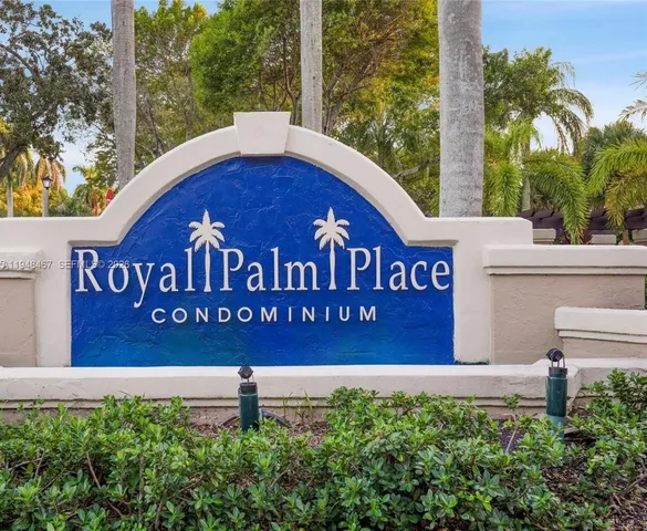 a view of outdoor space with signage and flags