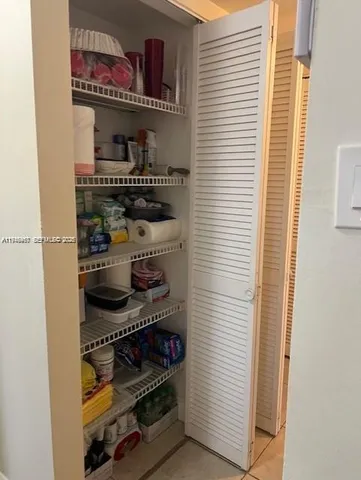 a close view of shoes and cabinets