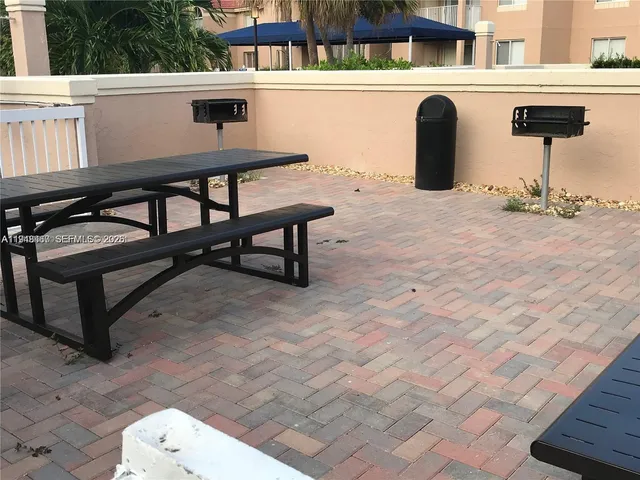 a view of a terrace with chairs