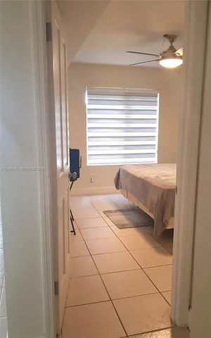 a bathroom with a sink and a window