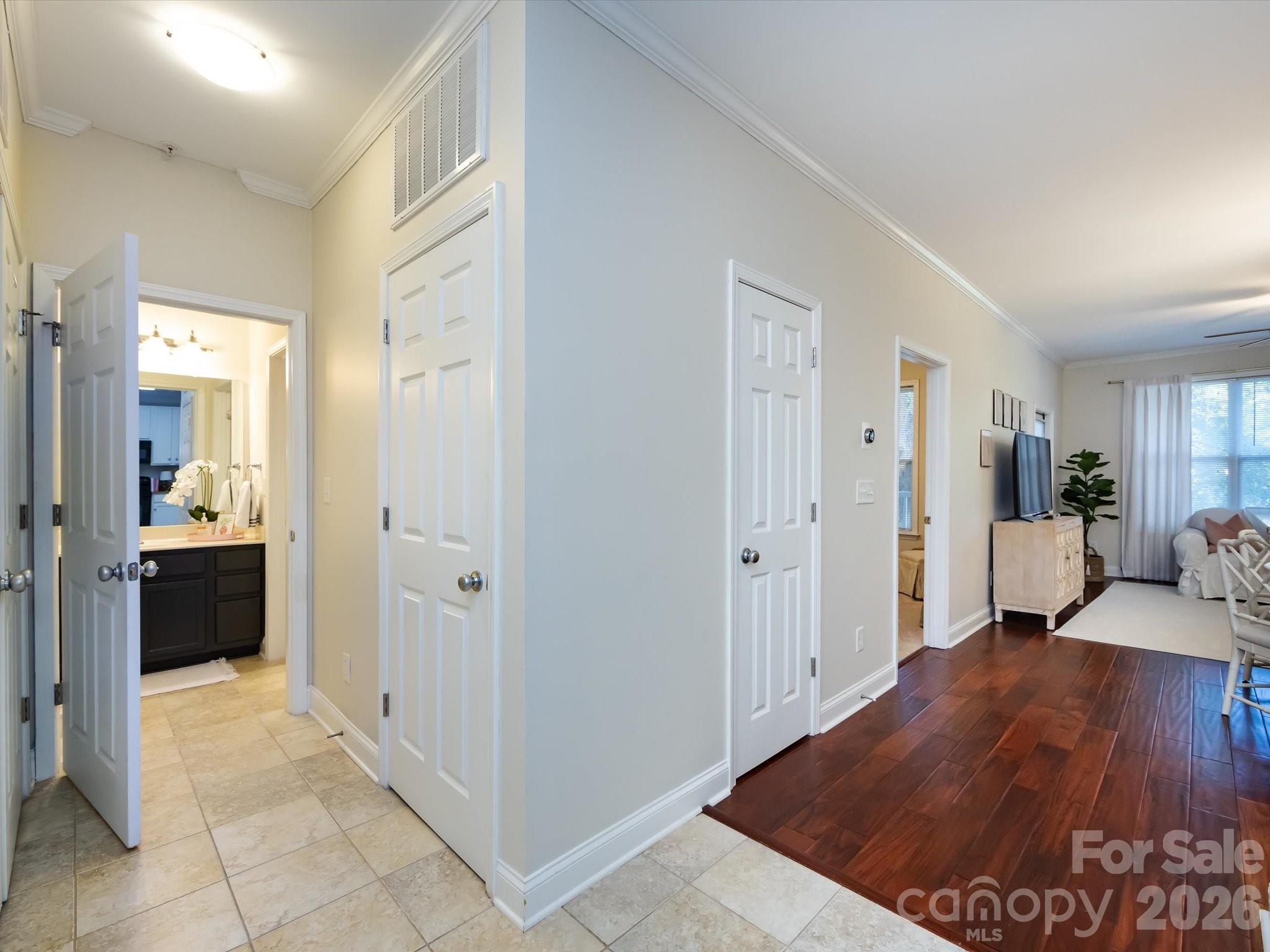 1000 East Woodlawn Road, Unit 113 Charlotte, NC 28209 - Photo 6 of 32 a view of a bedroom with tub and bathroom